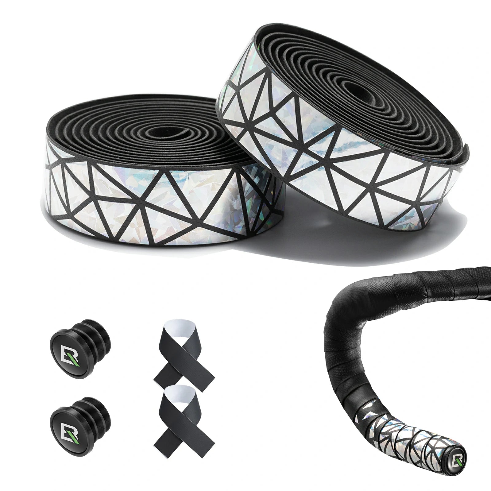 Bicycle handlebar tape and matching grips shown on a white background, including two rolls of black-and-white geometric tape, a wrapped handlebar section, two black grip plugs, and two black-and-white ribbons. #Color_Silver