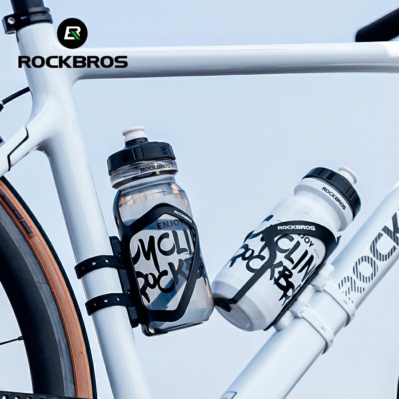 Bicycle water bottles with 'ROCKBROS' branding attached to a bike frame.