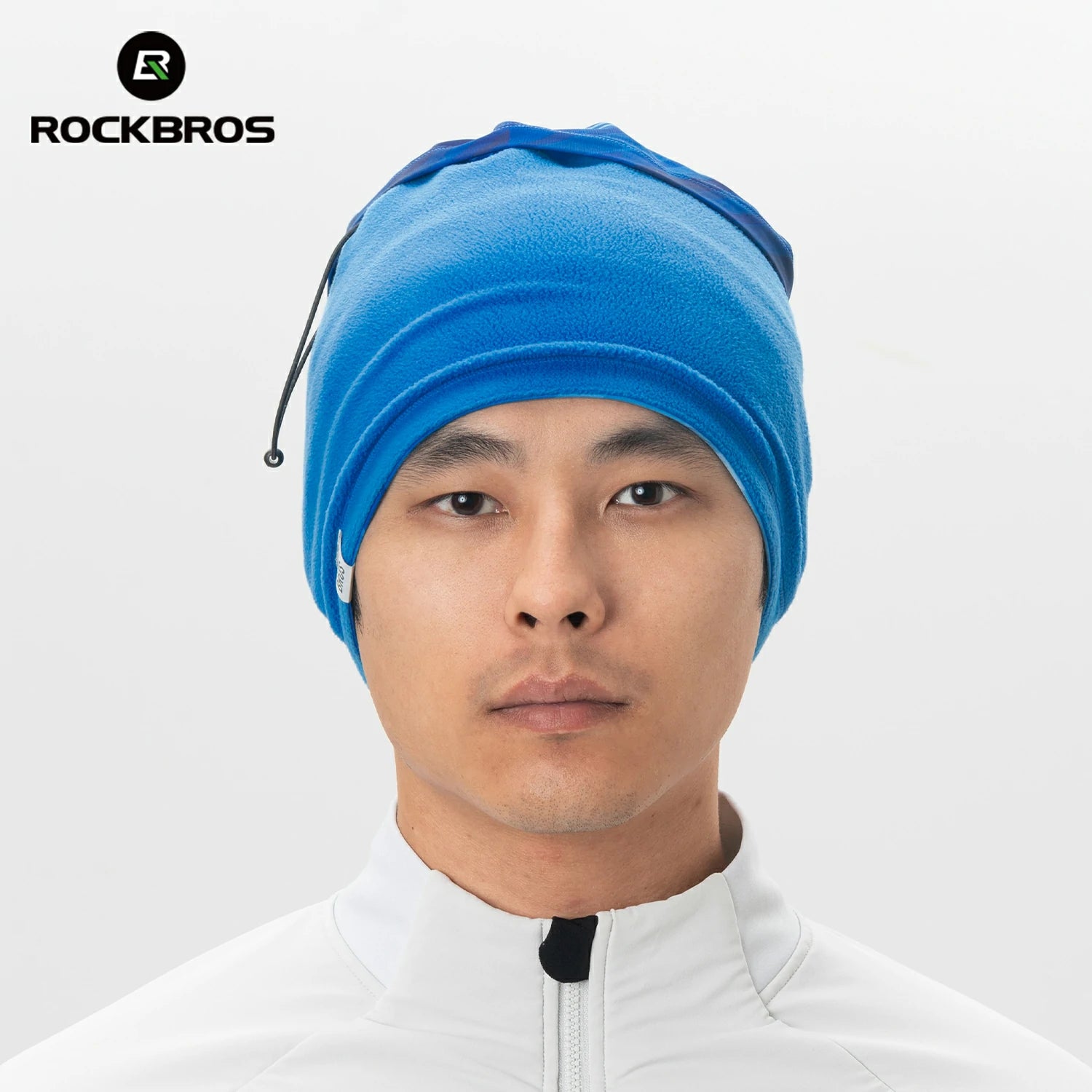 Person wearing a blue headband with a white background and RockBros logo. #Color_Blue