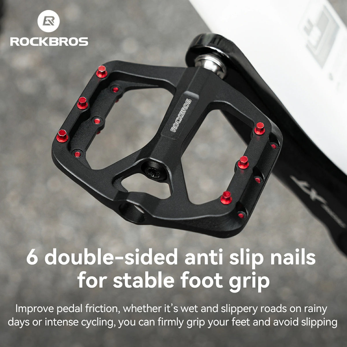 Black Rockbros bicycle pedal with red anti-slip double-sided nails, shown on a gray pavement background with promotional text overlay.