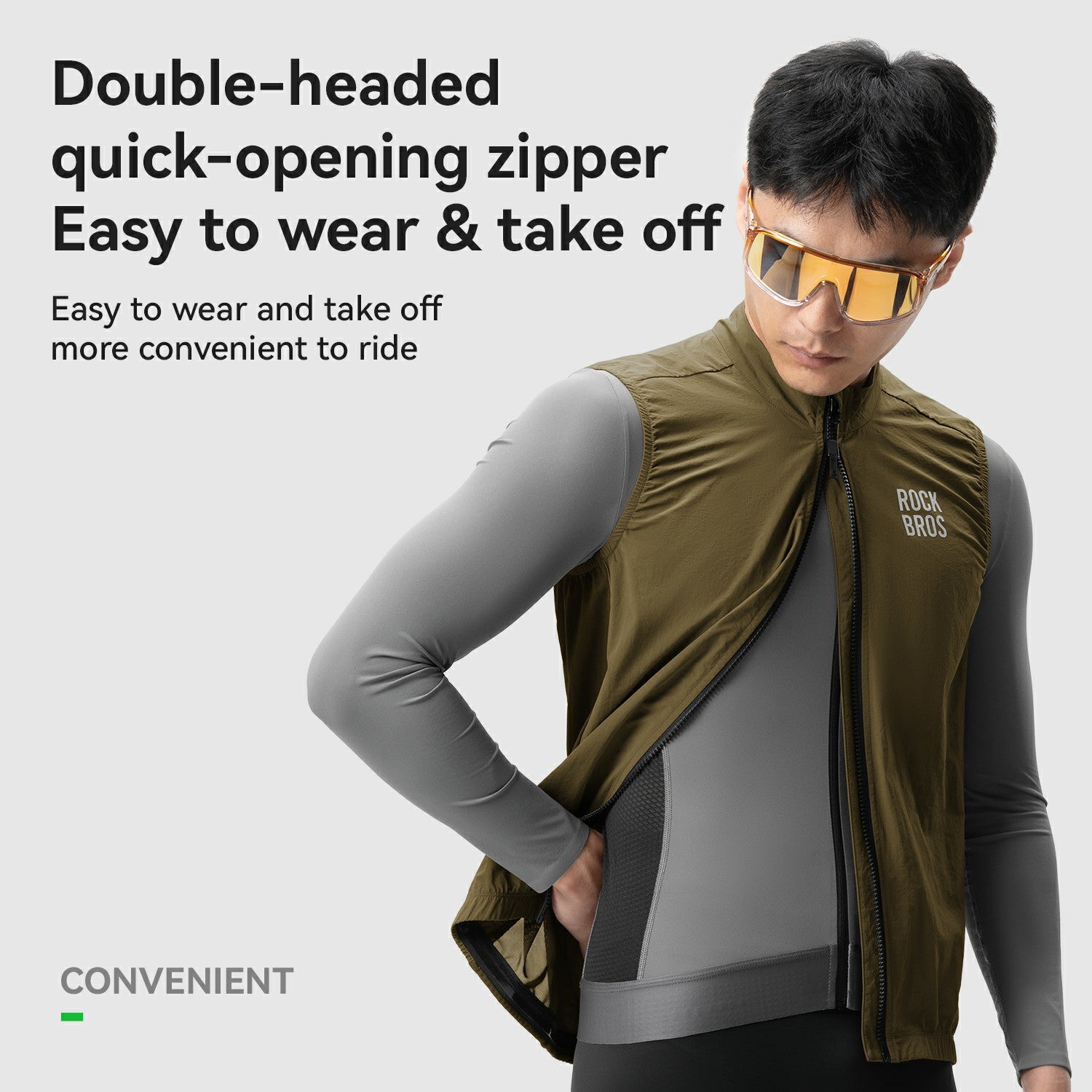 Person wearing a green vest with text about a double-headed quick-opening zipper