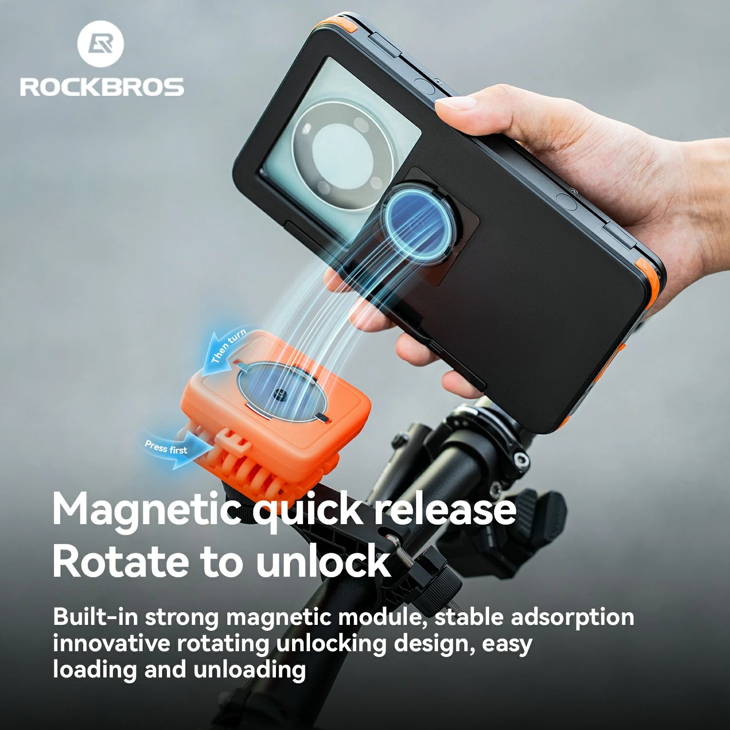 Hand holding a device with magnetic quick release feature, featuring ROCKBROS branding.