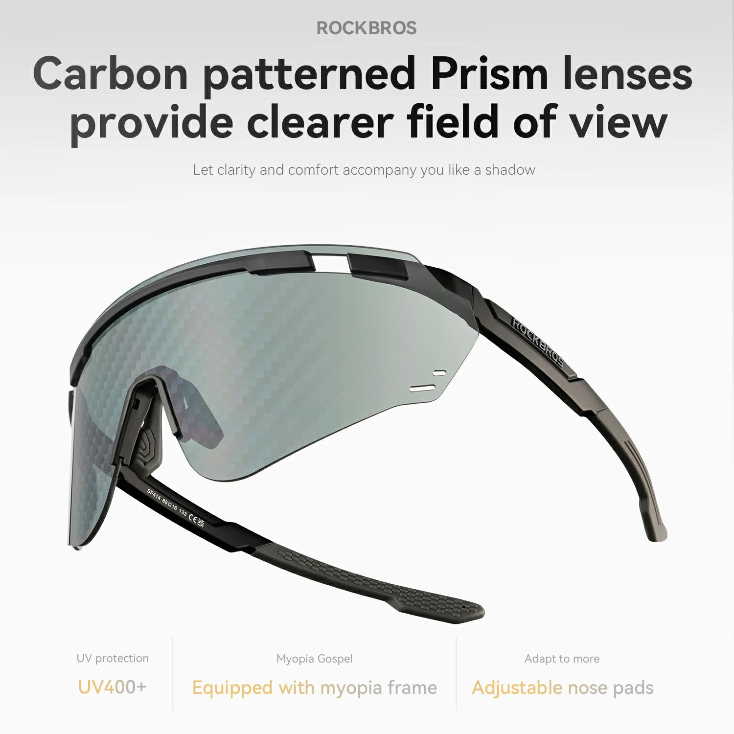 Rockbros shield-style sunglasses with large carbon-patterned prism lenses and black arms, shown on a light gray background with marketing text above and feature callouts below.