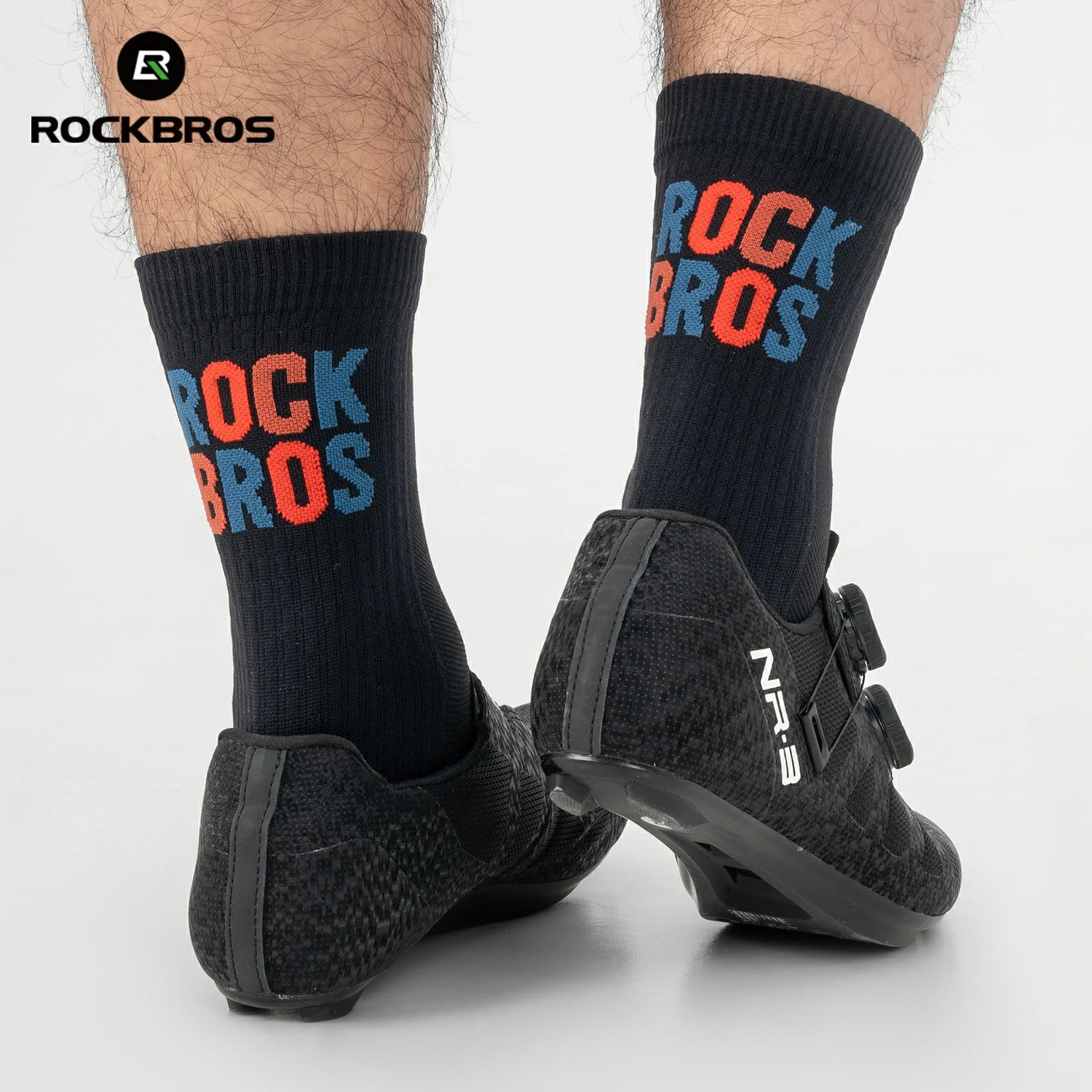 Black socks with 'RockBros' branding worn with black shoes on a white #color_black