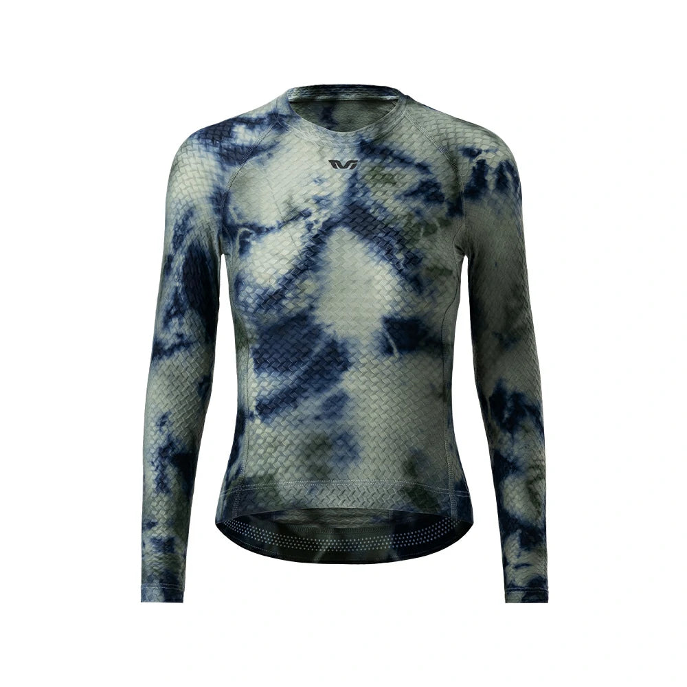 A long-sleeve athletic compression top with a blue and gray tie-dye pattern, featuring a textured mesh fabric and a small black logo on the chest, displayed on a solid white background. #Color_Gray