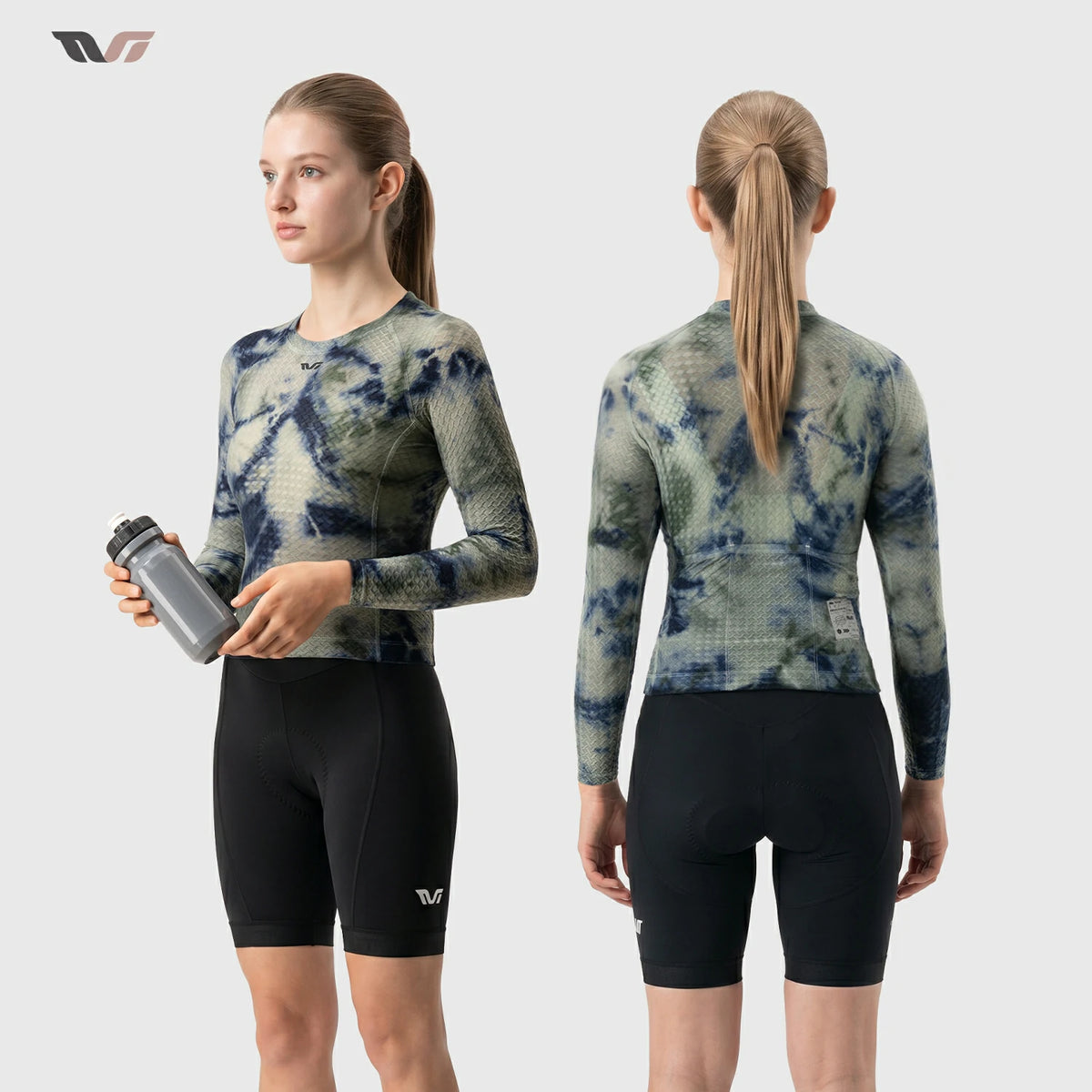 A female cyclist shown from the front and back wearing a long-sleeve athletic jersey with a blue and green tie-dye pattern and black biker shorts, against a light gray studio background.