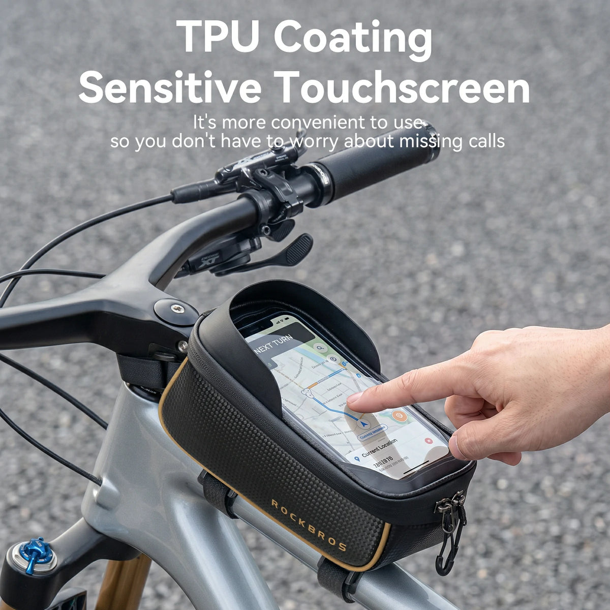 A black Rockbros TPU-coated sensitive touchscreen phone bag mounted on a bicycle handlebar, with a hand touching the screen. White text at the top reads 'TPU Coating Sensitive Touchscreen'.