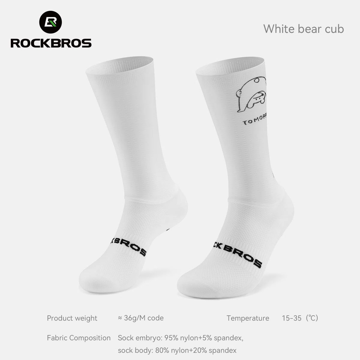 A pair of white crew socks by Rockbros, featuring a black line-art bear graphic and the brand name on the cuff, with additional product specifications printed below on a light gray background. #Color_Bear