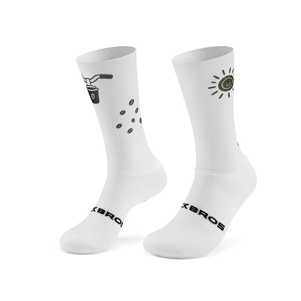A pair of white crew socks with black printed graphics and the brand name 'ROCKBROS' visible on the toes, set against a plain white background. #Color_Sun