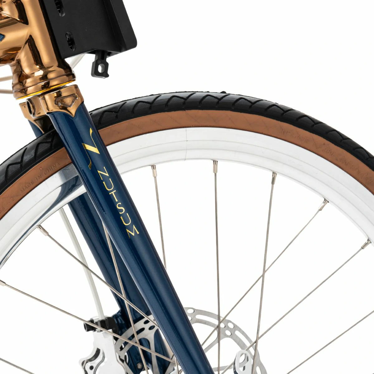 Close-up of a bicycle wheel with a blue frame and gold accents on a white background #Color_Blue
