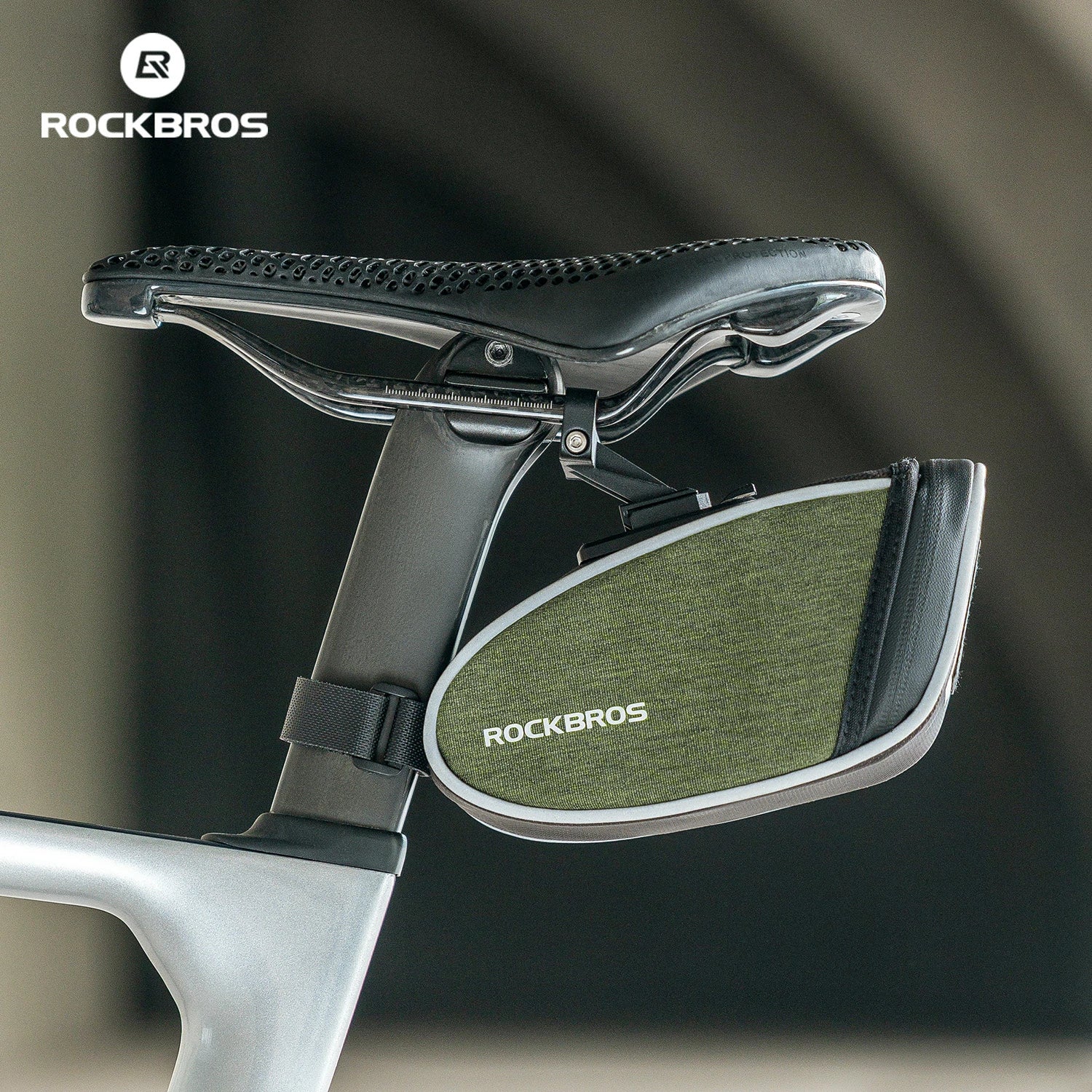 Bicycle seat with a green storage bag featuring the RockBros brand on a blurred background. #color_Mount Version