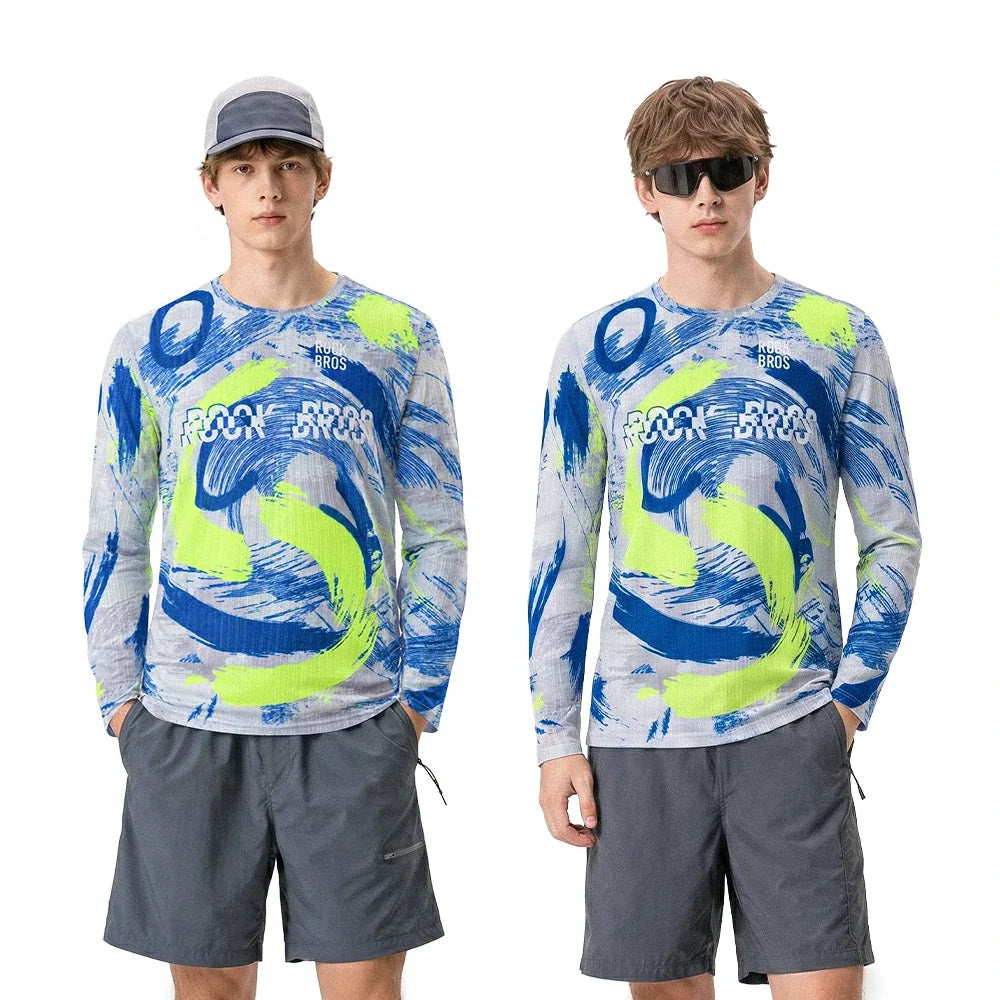 Two male models wearing matching long-sleeve athletic shirts with a blue and neon yellow abstract wave pattern and the text 'ROCKBROS' across the chest, paired with gray shorts, on a white studio background.