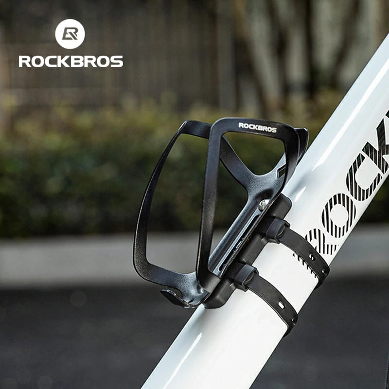Bicycle water bottle holder with RockBros branding on a blurred outdoor background