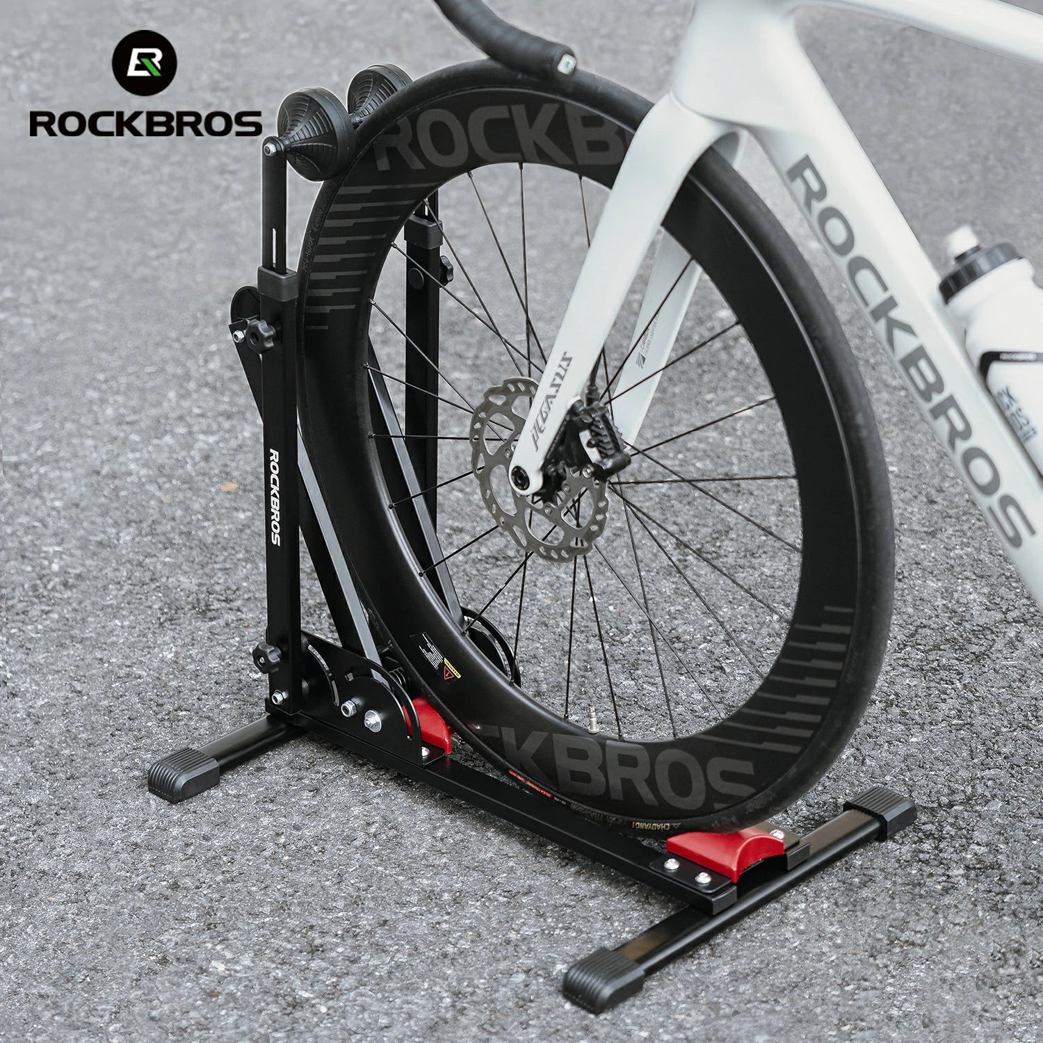 Bicycle on a stationary trainer with 'Rockbros' branding on both bike and equipment.