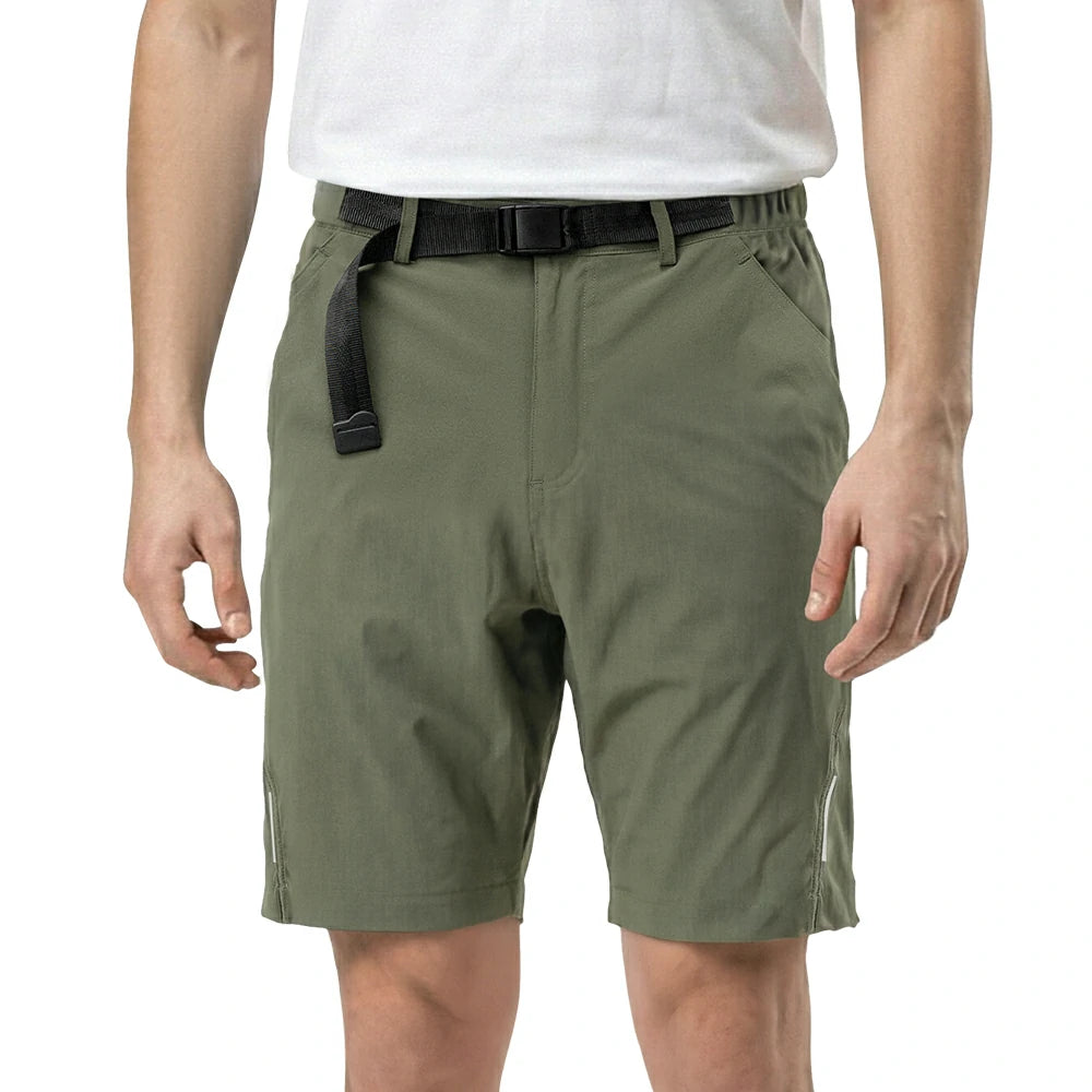 Person wearing olive green shorts on a white background
