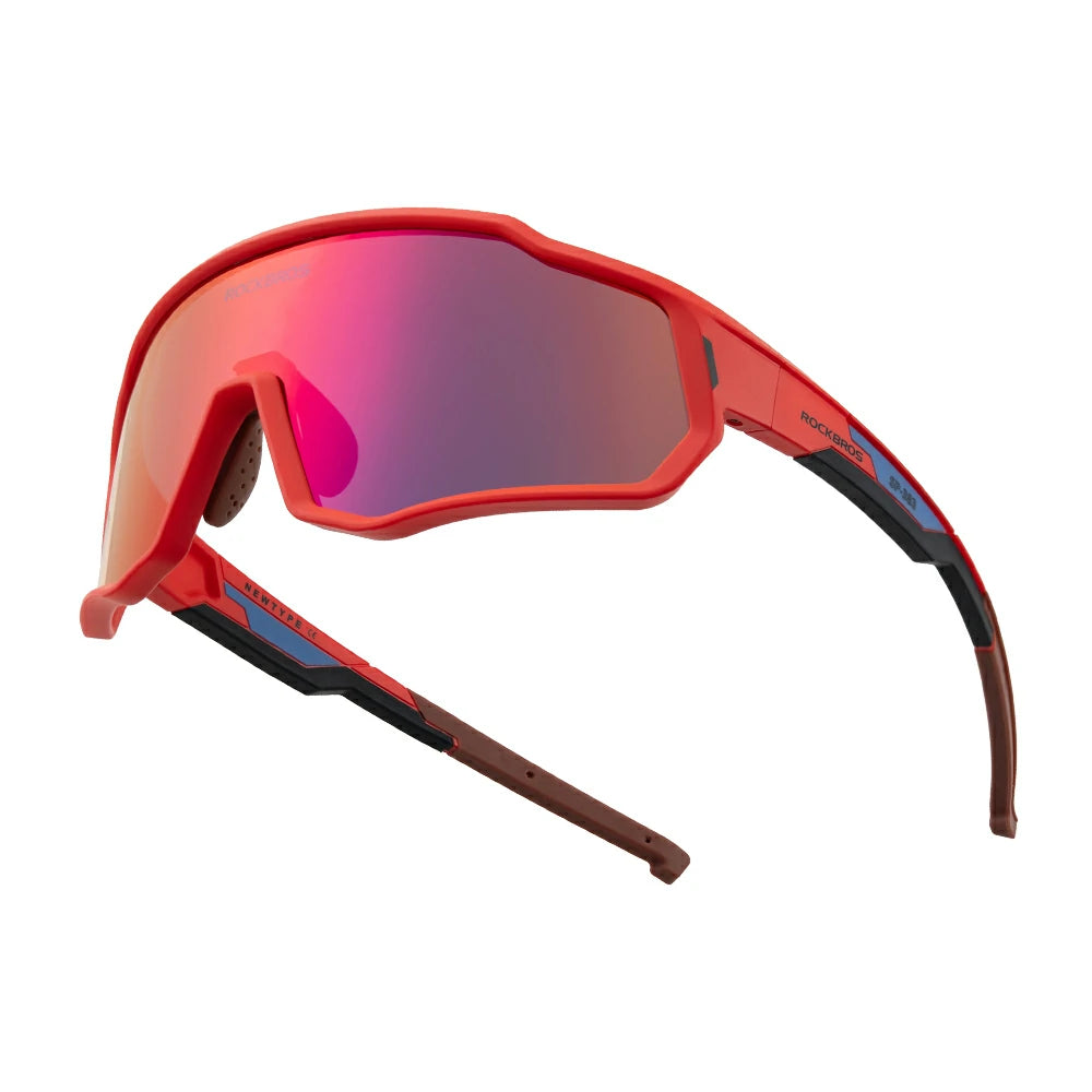 Red sunglasses with a reflective lens on a white background #color_Red / Polarized Red Purple