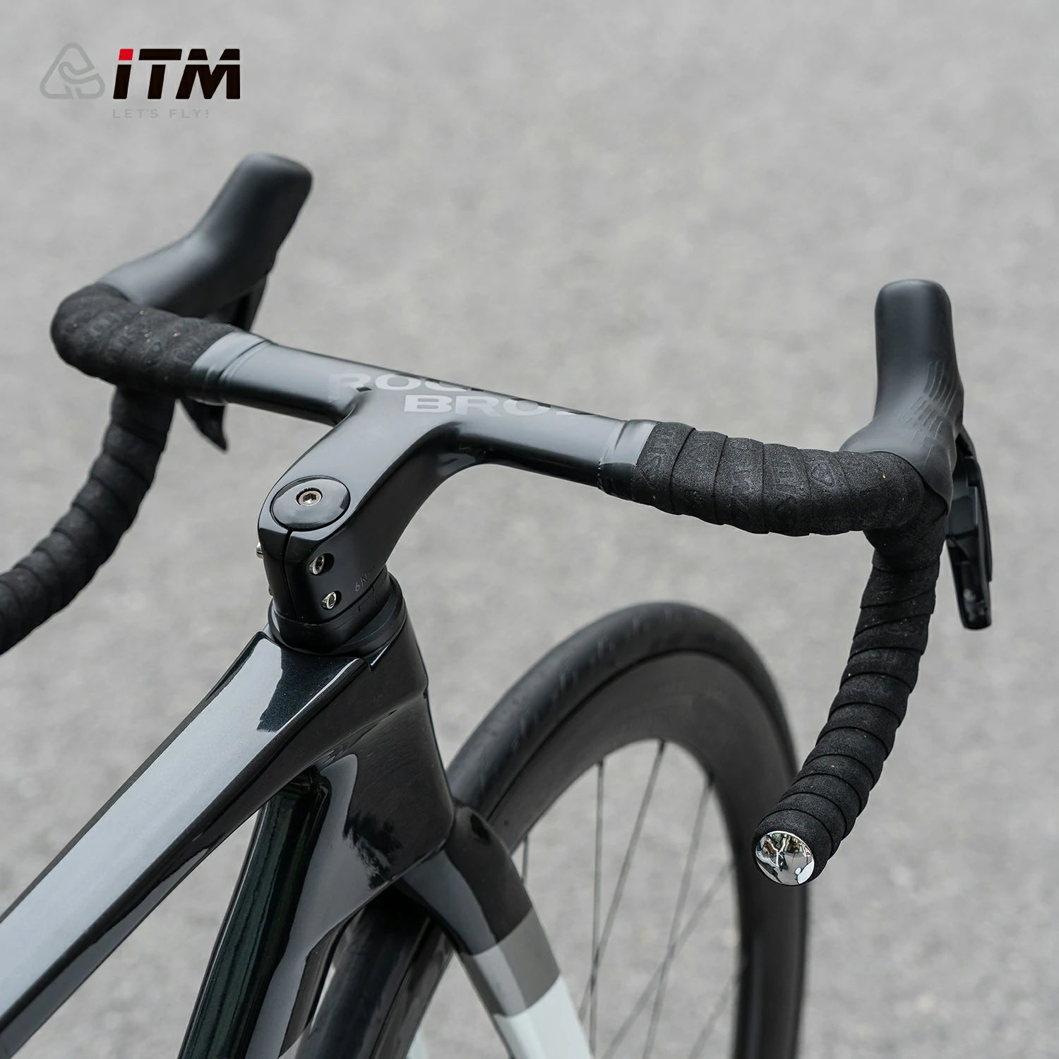 Black handlebar tape with a thick center and tapered edge construction.