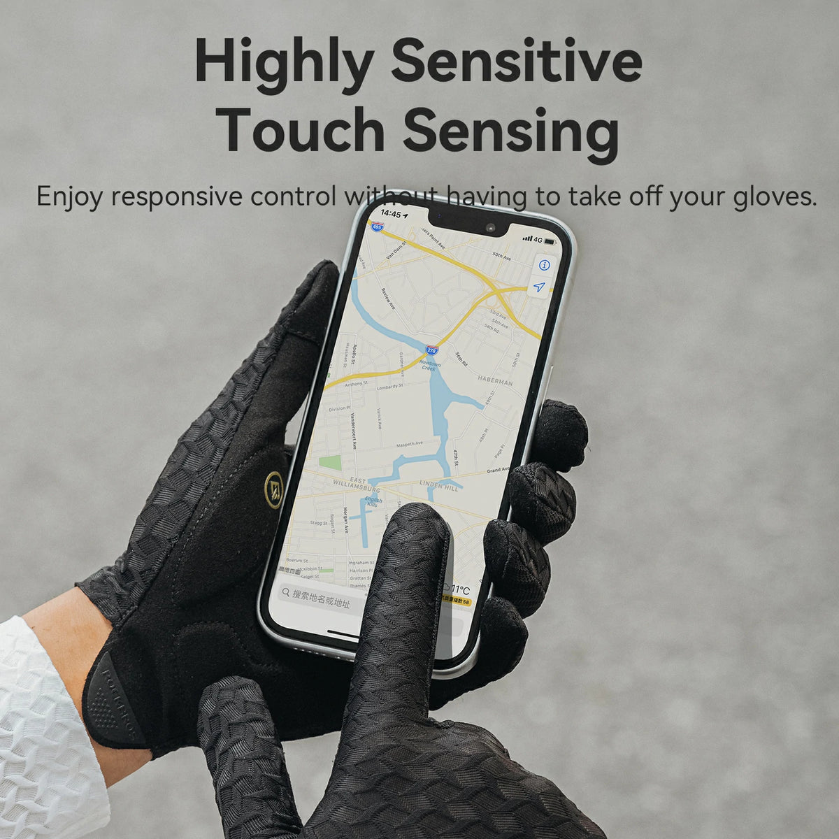 Black textured touchscreen gloves shown on hands holding a smartphone with a map app, with text reading 'Highly Sensitive Touch Sensing' and 'Enjoy responsive control without having to take off your gloves.'.