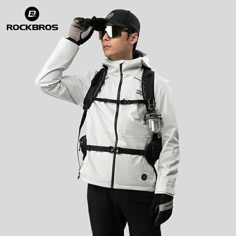Person wearing a white jacket with black accents, sunglasses, and a cap on a gray background with 'RockBros' branding. #Color_white