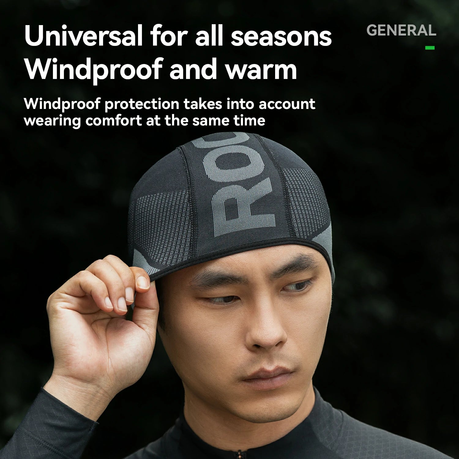 Person wearing a black cap with text about windproof and warm properties on a dark background