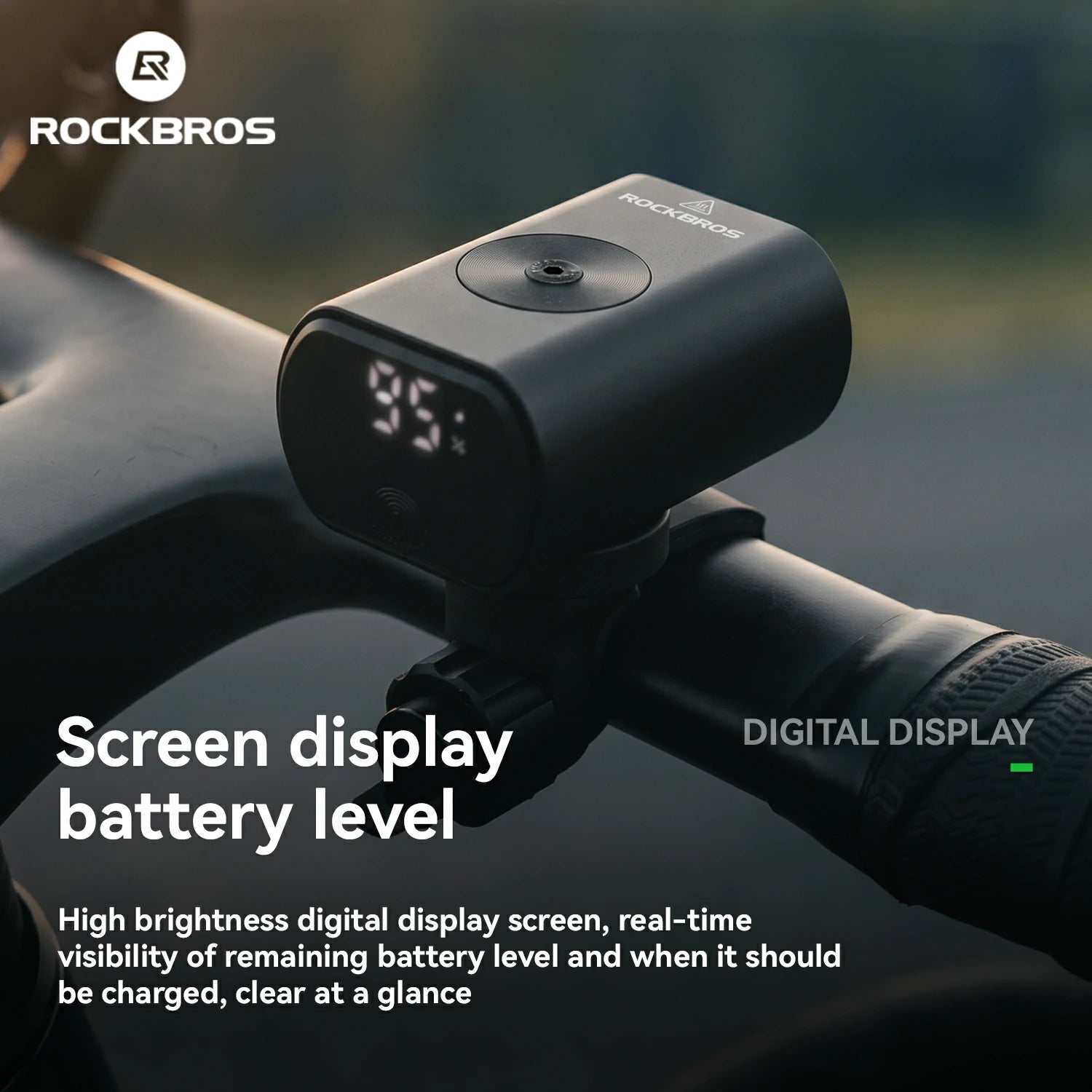 A black Rockbros digital battery display mounted on a bicycle handlebar, showing a bright 35% screen reading. The image includes promotional text highlighting the high-brightness digital display and features, with the Rockbros brand logo in the top left corner.
