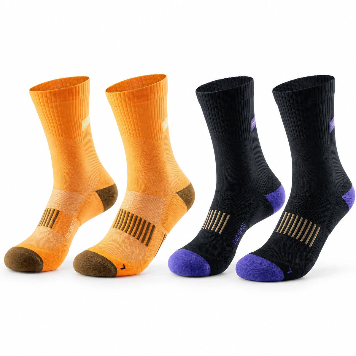 Four athletic crew socks arranged in two pairs on a white background: two bright orange socks with brown accents and two black socks with purple and gold accents. #Color_orange+black