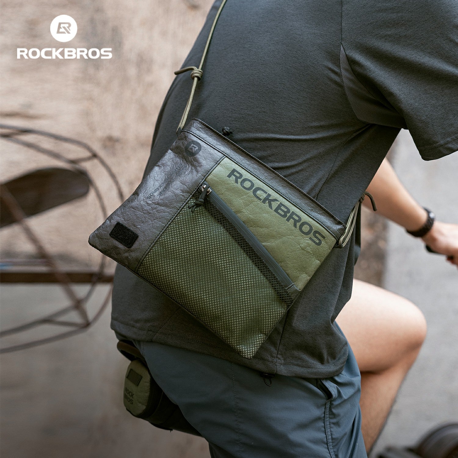 Person wearing a green and black shoulder bag with 'ROCKBROS' branding.