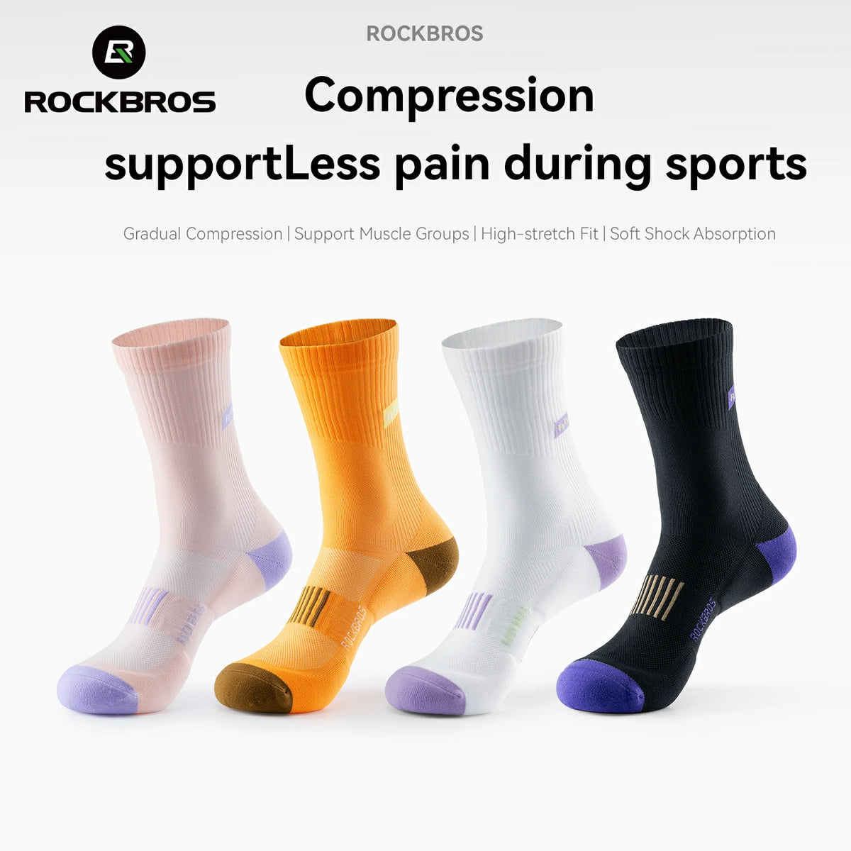Four pairs of ROCKBROS compression socks shown on invisible forms against a white background, with text at the top reading 'Compression supportLess pain during sports' and 'ROCKBROS'. The socks come in pale pink, orange, white, and black, each with contrasting purple accents at the toe and heel.
